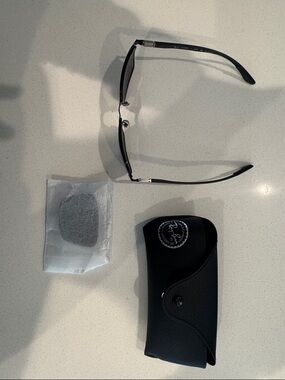 Ray-Ban RB3721CH sunglasses with two sets of polarized lens.